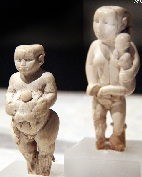 Egyptian predynastic ivory figures of women with child (c3000 BCE) at Neues Museum. Berlin, Germany.