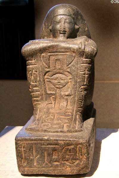 Egyptian stone statue of priest Sen-nefer (c1360 BCE) (New Kingdom, 18th Dynasty) at Neues Museum. Berlin, Germany.