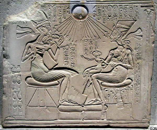 Egyptian stone altar relief of Akhenaten, Nefertiti & three of their daughters (c1350 BCE) (New Kingdom, 18th Dynasty) at Neues Museum. Berlin, Germany.
