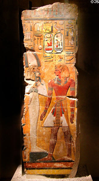Egyptian painted stone relief of king Seti I in front of god Osiris (c1290 BCE) (New Kingdom, 19th Dynasty) from Thebes West at Neues Museum. Berlin, Germany.