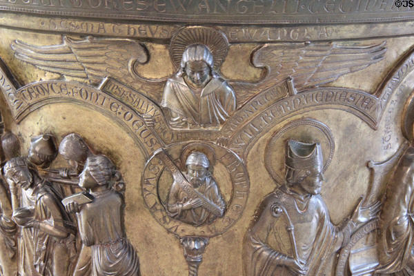 Winged angel of St Matthew Evangelist on baptismal font (c1230) from Lower Saxony at Bode Museum. Berlin, Germany.