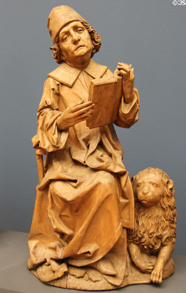 Evangelist Mark with lion wood carving (1490-2) by Tilman Riemenchneider of Würtzburg at Bode Museum. Berlin, Germany.
