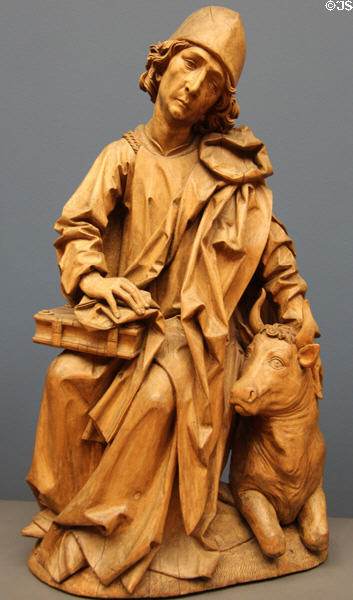 Evangelist Luke with bull wood carving (1490-2) by Tilman Riemenchneider of Würtzburg at Bode Museum. Berlin, Germany.