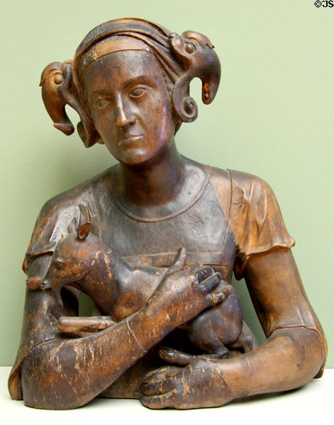 Woman with Billy Goat wood carving (before 1518) from Augsburg at Bode Museum. Berlin, Germany.