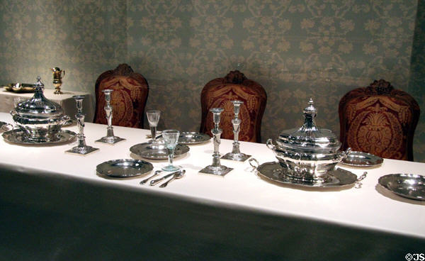 Silver serving dishes, plates, candlesticks (18thC) by various makers of Augsburg at German Historical Museum. Berlin, Germany.