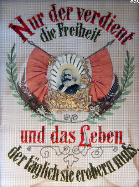 Embroidered Marxist household blessing wall hanging (1898) which survived Nazis in hiding at German Historical Museum. Berlin, Germany.