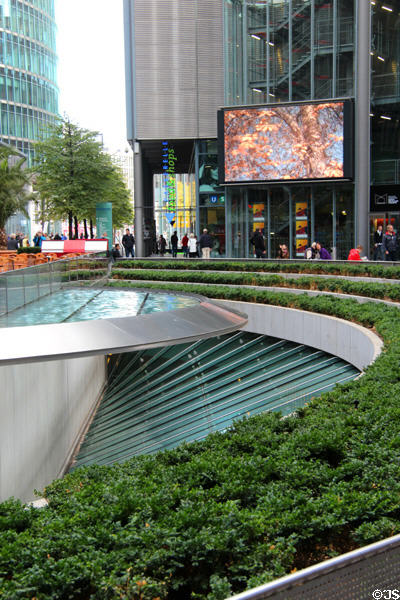 Giant TV screen over landscaping at Sony Center. Berlin, Germany.
