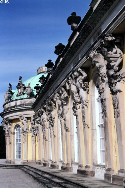 Carved figures along front of Sanssouci Palace (1747) at Sanssouci Park. Potsdam, Germany.