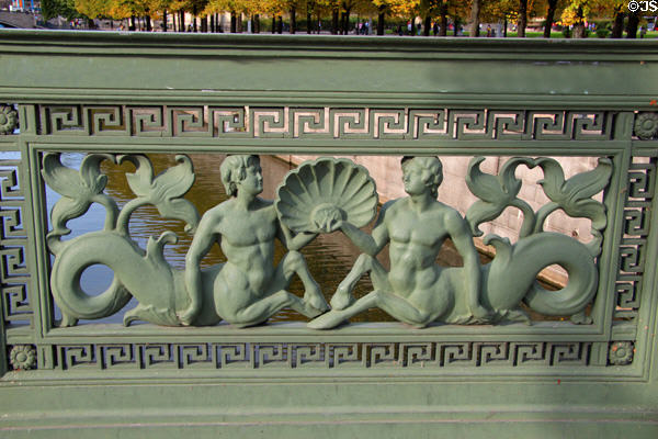 Cast iron railing in form of two mermaids with shell on Schloss bridge. Berlin, Germany.
