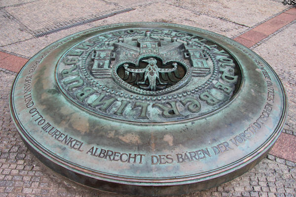 Bronze plague on ground at St Nicholas' Church. Berlin, Germany.