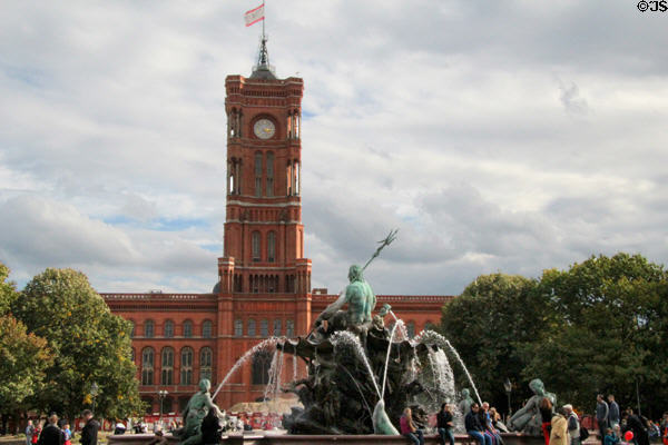 Rotes Rathaus beyond Neptune Fountain. Berlin, Germany.