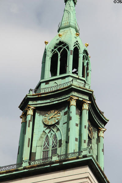 Clock tower on St Mary's Church spire. Berlin, Germany.