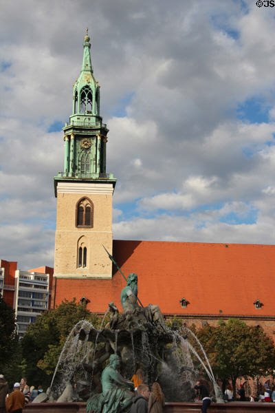 St. Mary's Church over Neptune's Fountain. Berlin, Germany.