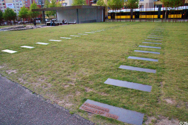 Rows of slabs mark line of tunnels built under Berlin Wall at Bernauer Straße Berlin Wall Memorial. Berlin, Germany.