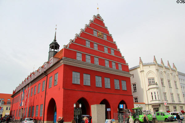 Town Hall in red heritage building on market square. Greifswald, Germany.