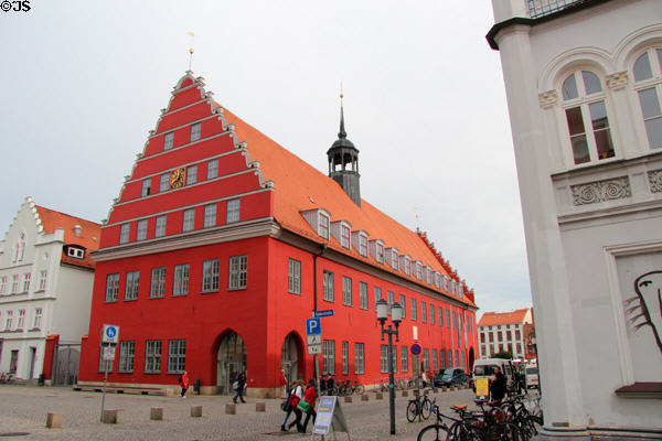 Town Hall in red heritage building on market square. Greifswald, Germany.