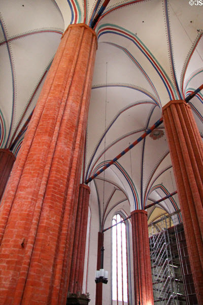 Gothic brick columns & ceiling of St Mary's Church. Greifswald, Germany.
