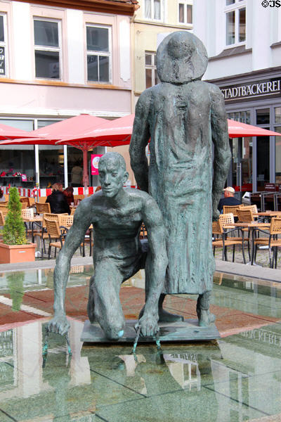 Fischerbrunnen Fischmarkt fountain statues. Greifswald, Germany.