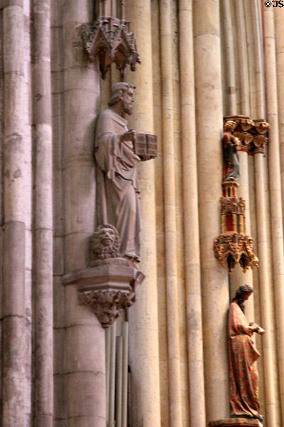 Statue of Evangelist St. Mark with his lion symbol at Köln Cathedral. Köln, Germany.