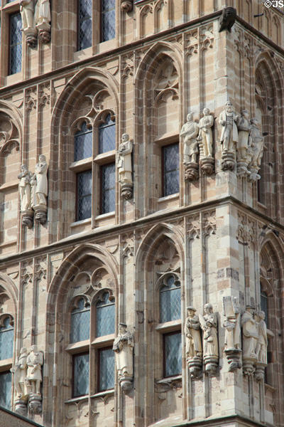 Figures of historic well-known Cologne citizens on City Hall. Köln, Germany.