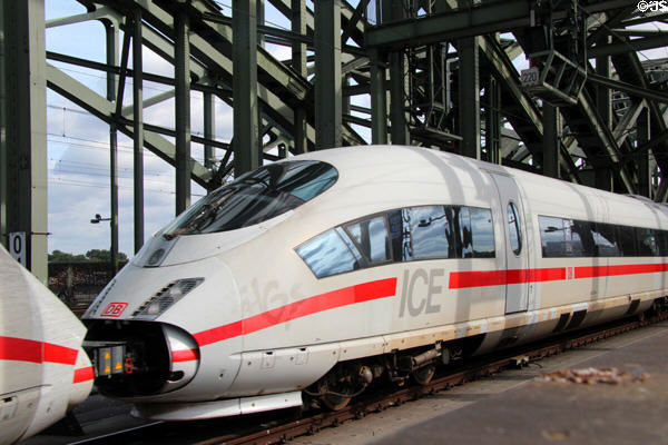 DB Intercity Express Train (ICE) crossing Hohenzollern Bridge. Köln, Germany.