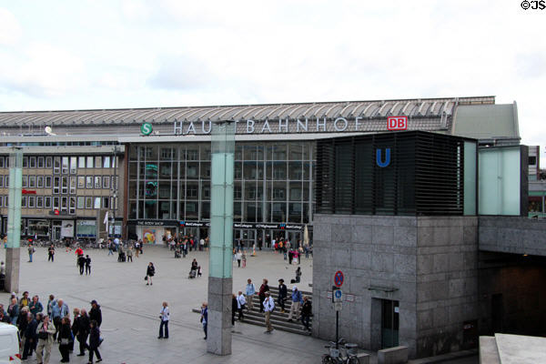 Travelers in plaza outside Köln Central Station. Köln, Germany.