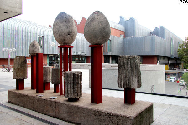 Columnar stones mounted on beams as a sculpture outside Roman Germanic Museum. Köln, Germany.