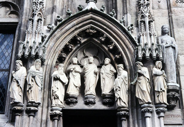 Human figures & other carvings surrounding entrance to Historic City Hall. Köln, Germany.