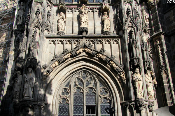 Statuary & Gothic window framing on Aachen Cathedral. Aachen, Germany.