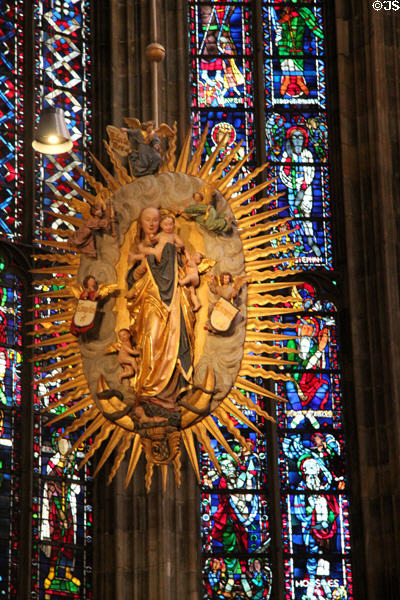 Image of Virgin Mary & Child standing on crescent moon which represents her miraculous conception & birth in Palatine Chapel at Aachen Cathedral. Aachen, Germany.