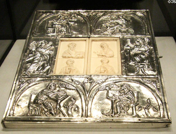 Silver book cover (c1170-80) depicting Sts John the Evangelist, John the Baptist, George & Theodore on ivory panels, together with Evangelists & two angels at Aachen Cathedral Treasury. Aachen, Germany.