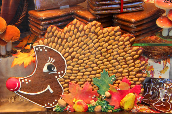 Hedge hog constructed of confectionary & nuts in store window. Aachen, Germany.