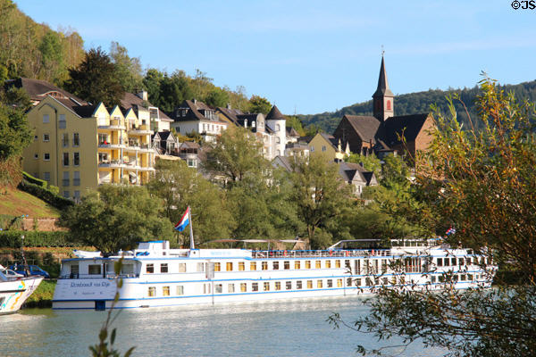 Mosel River cruise boats docked at town of Cond, opposite Cochem. Cochem, Germany.