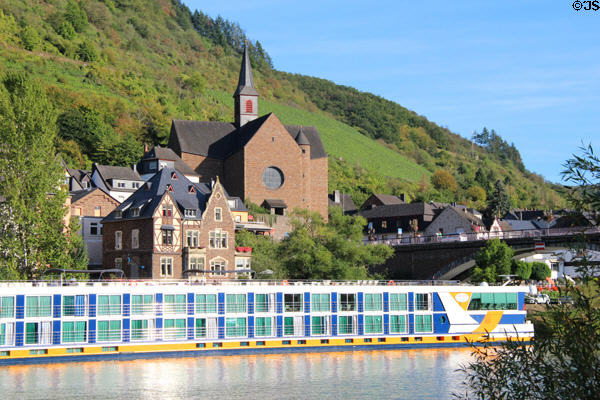 Cruise boat with Saint Remaclus's Parish Church (1964-67) in Cond in background. Cochem, Germany. Architect: Emil Steffann.