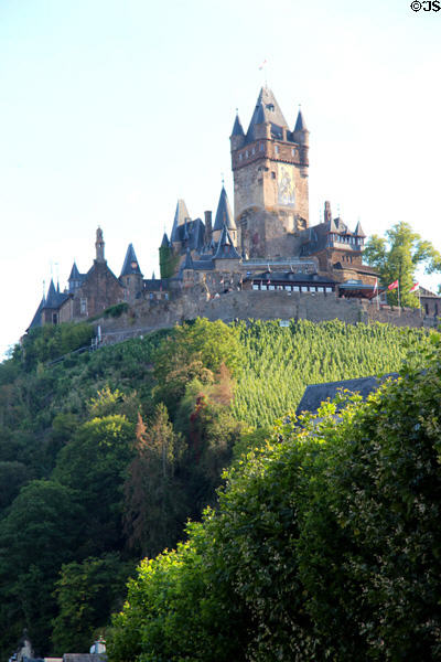 Towers, turrets, pinnacles & walls of Imperial Castle (1130, rebuilt 19thC in Gothic Revival style). Cochem, Germany.
