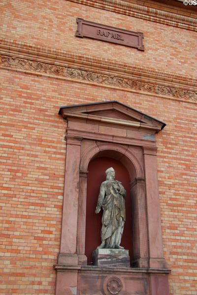 Statue of Rafael, Italian Renaissance painter, in niche of original brick building at Hamburg Fine Arts Museum. Hamburg, Germany.