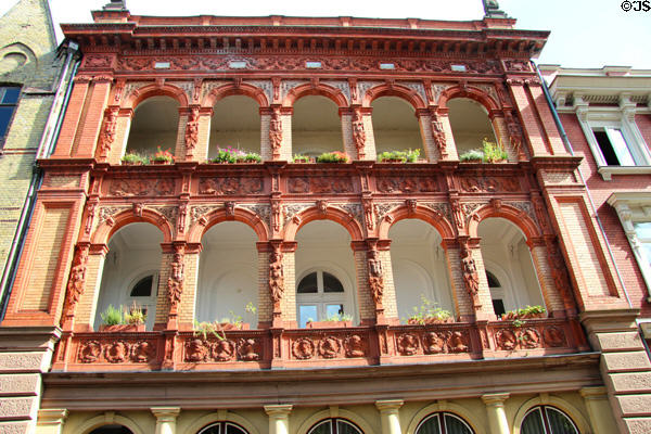 Building with elaborate terra cotta arches & decorations. Lübeck, Germany.