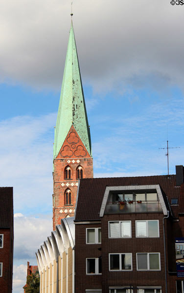 St Mary's Church steeple over market building (Schüsselbuden). Lübeck, Germany.