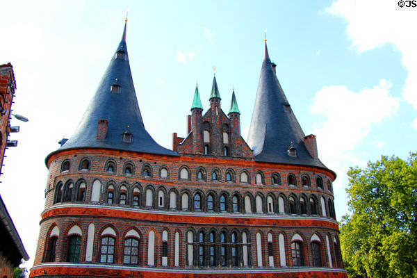 Trave Riverside facade with larger windows of Holsten Gate. Lübeck, Germany.