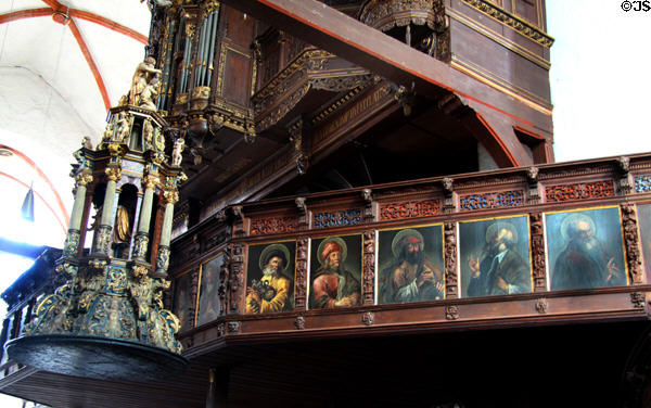 Paintings of saints on organ loft screen at St Jacob's Church. Lübeck, Germany.