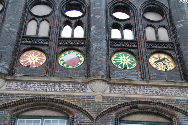 Shields & written history of New Chamber (1594-1612) at Lübeck Rathaus. Lübeck, Germany.