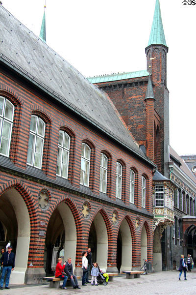 Long house arcade (1308, refaced 1875) brickwork at Lübeck Rathaus. Lübeck, Germany.