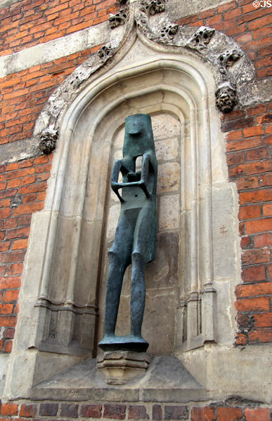 Modern sculpture in niche outside St Annes Museum. Lübeck, Germany.