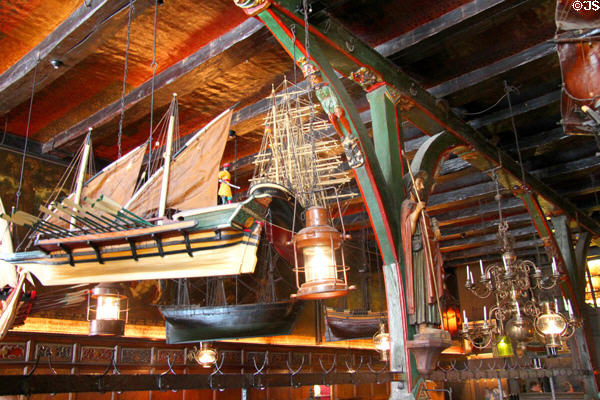 Ship models (16th-17thC) hanging from ceiling inside Seaman's Guildhall. Lübeck, Germany.