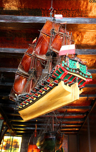 Ship model hanging from ceiling inside Seaman's Guildhall. Lübeck, Germany.
