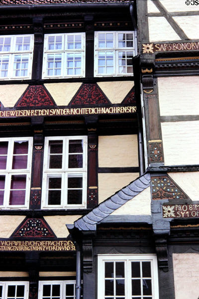 Details of half-timbered house with carved inscriptions. Celle, Germany.