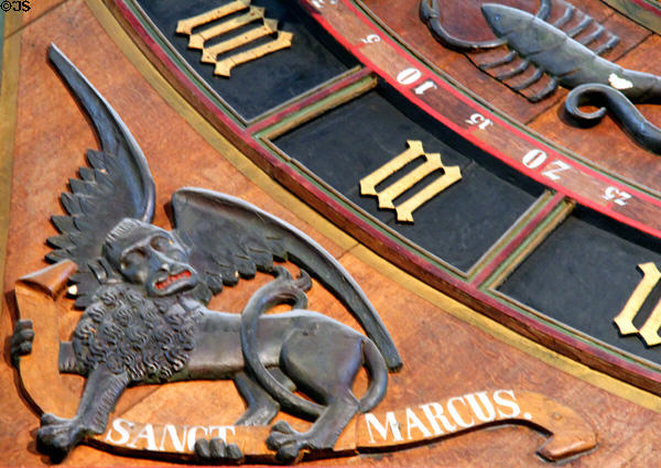 Winged lion of Evangelist Mark decorates Medieval astronomical clock (1472) at St. Mary's Church. Rostock, Germany.