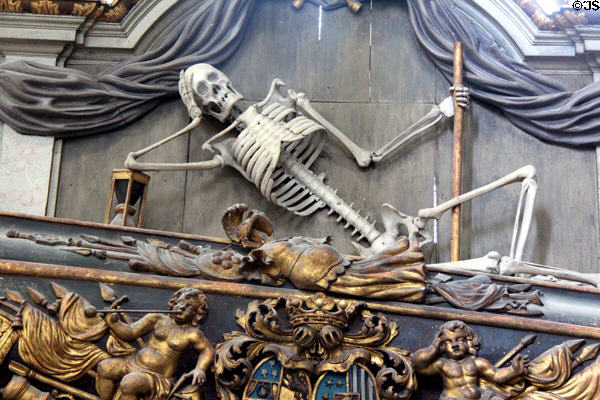 Skeleton leans on hour glass detail of funerary monument at St Mary's Church. Rostock, Germany.