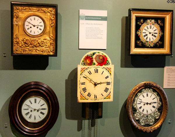 Biedermeir-style Schwarzwald clocks (early 19thC) at Cultural History Museum. Rostock, Germany.