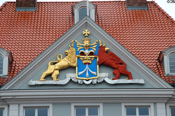 Arms in pediment of Commandantenhus (1751) old headquarters of Swedish military commander on Old Market Square. Stralsund, Germany.